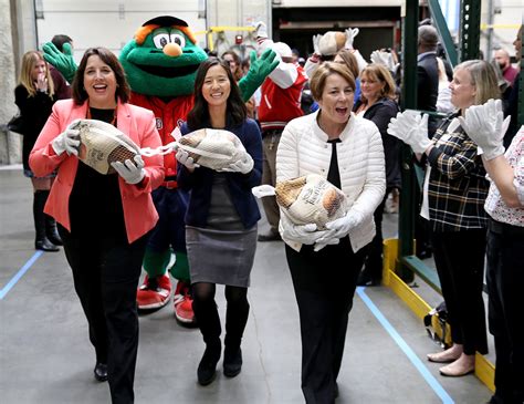 Greater Boston Food Bank passes 1,200 turkeys along ‘human chain’ to kick off holidays